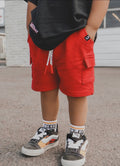 Red cargo shorts